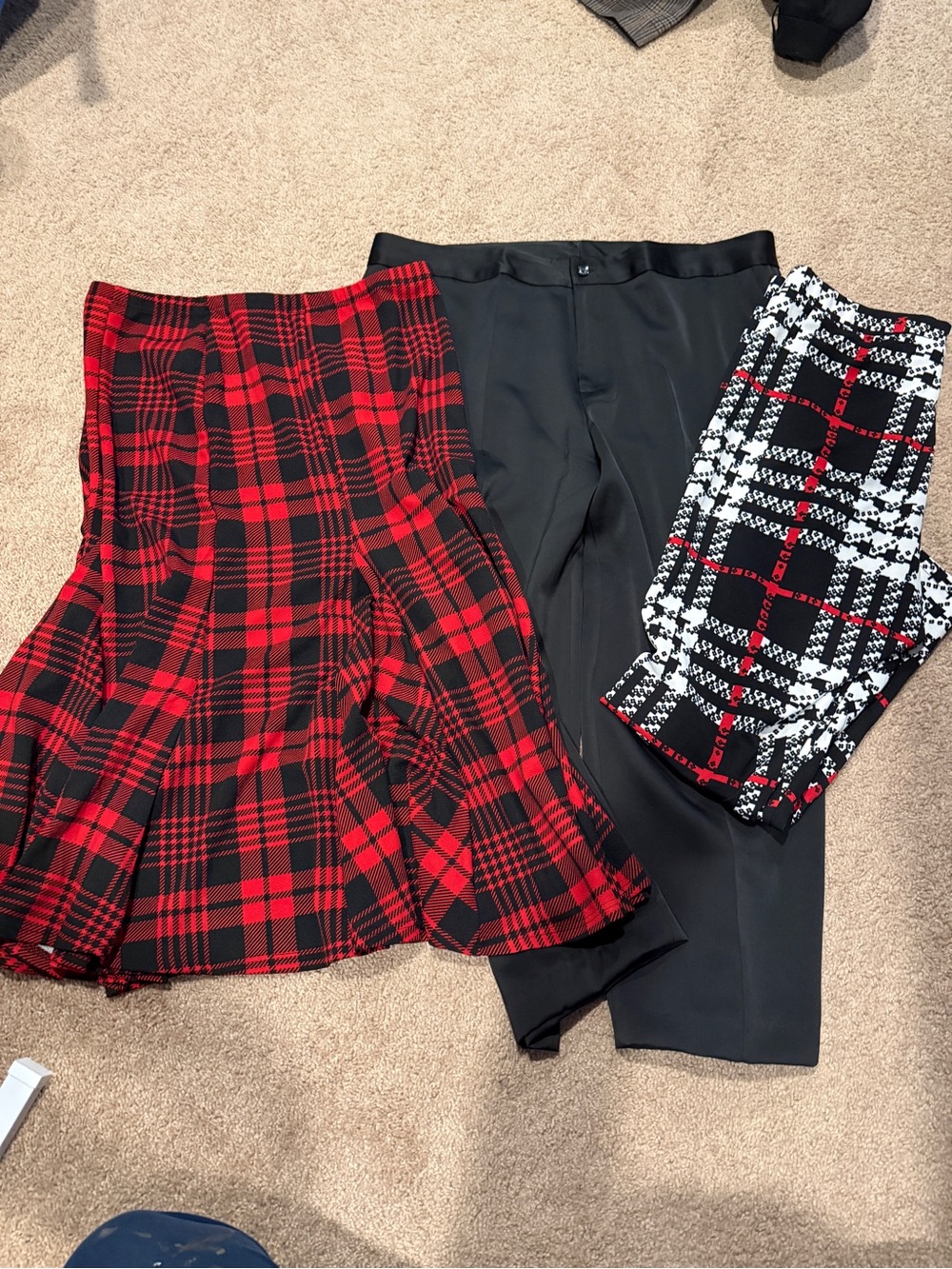 Trio of 2X black, red, and white plus size bottoms